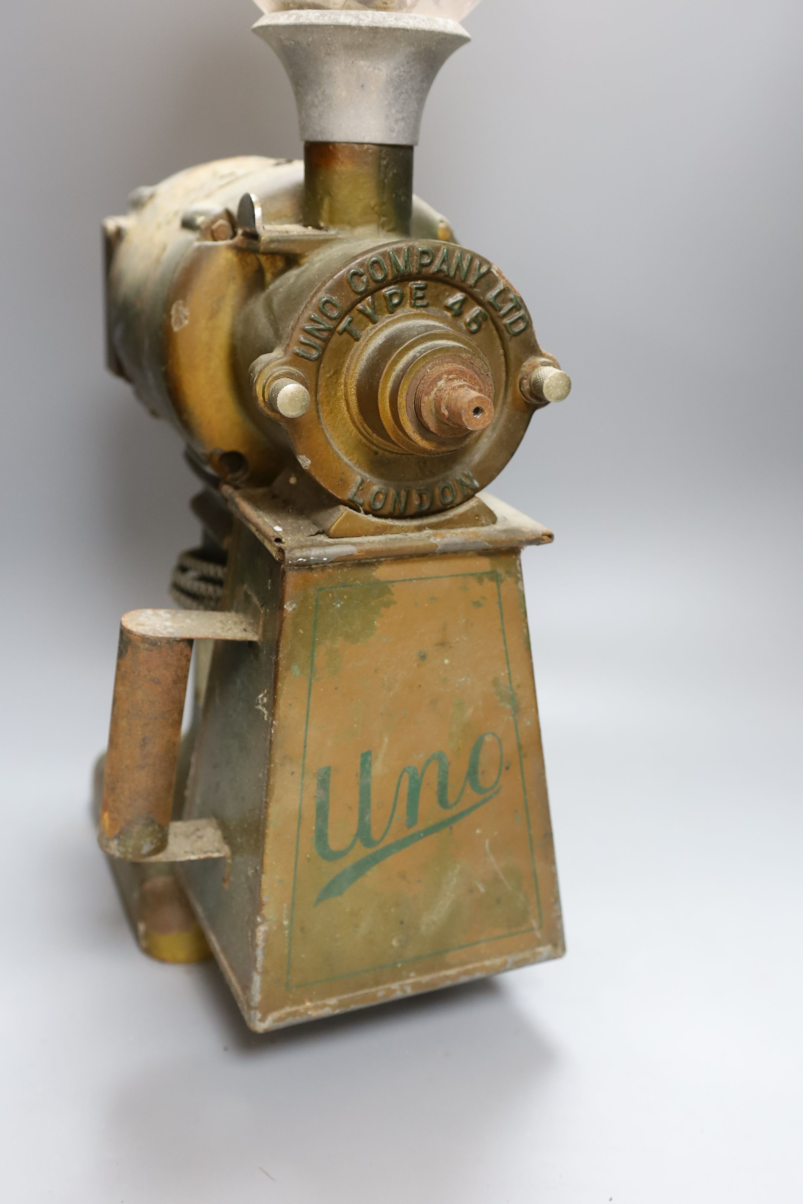 A vintage Uno Company Ltd. type 45 coffee grinder, 78cm tall
